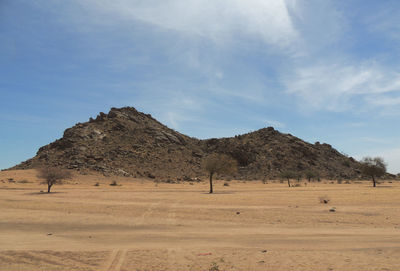 Scenic view of desert against sky