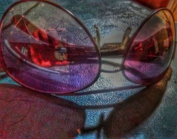 Close-up of sunglasses on table