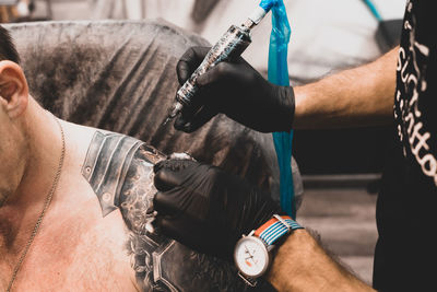 Midsection of man working