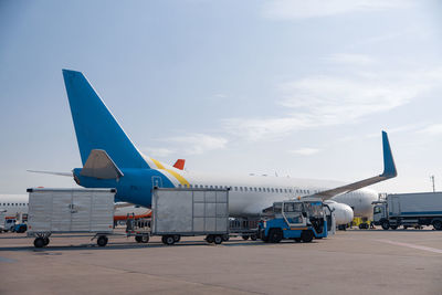 Airplane against sky