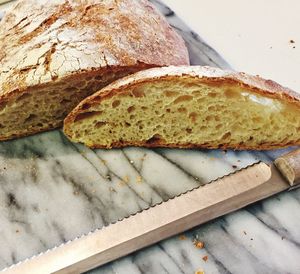 Close-up of breads on marble