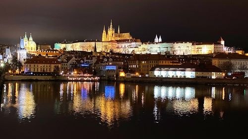 Illuminated buildings in city at night