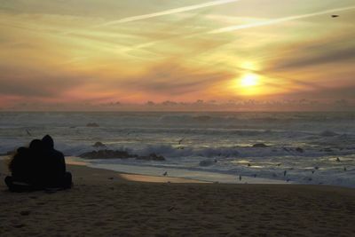 Scenic view of sea at sunset