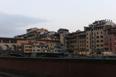 Buildings in city against sky
