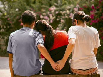 Rear view of couple kissing