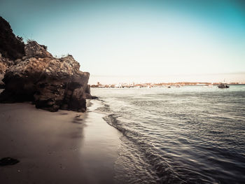 Scenic view of sea against clear sky