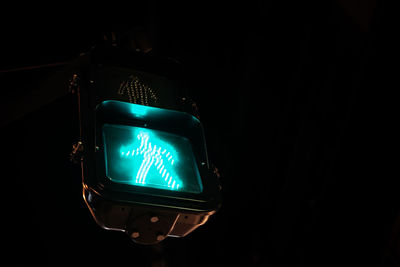 Low angle view of illuminated lamp post