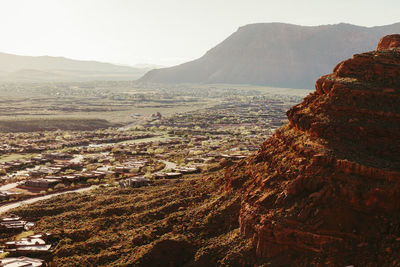 Red cliffs rise above suburban development on edge of st. george utah