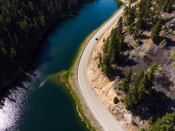 High angle view of road amidst trees