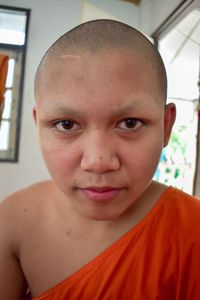 Close-up portrait of boy at home