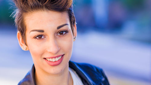 Close-up portrait of young woman