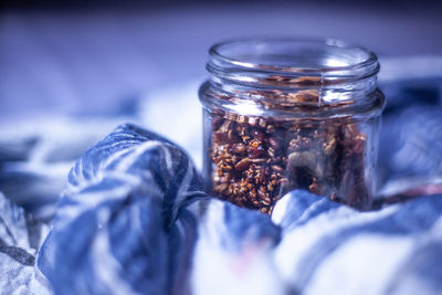 Close-up of glass of jar on table