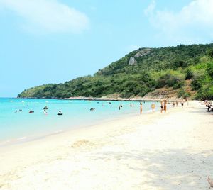 People on sandy beach