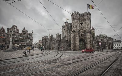 View of buildings against cloudy sky