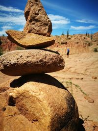 Stack of rocks against sky