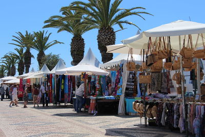 People at market stall