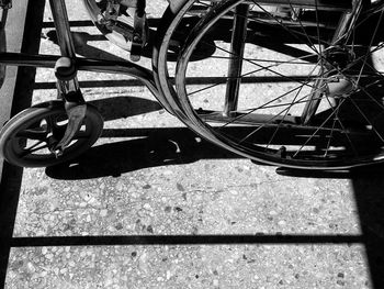 High angle view of bicycle wheel on sunny day