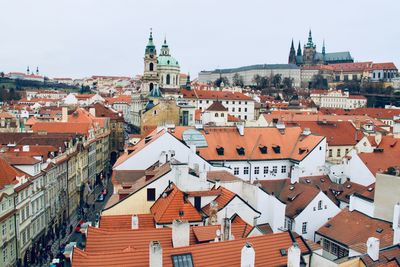 Aerial view of townscape against sky