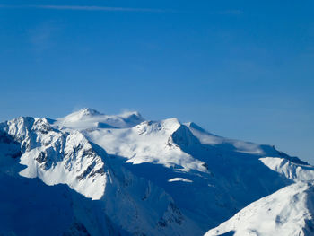 Windy snowcapped mountains