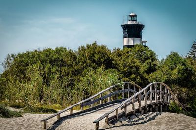 View of lighthouse against trees