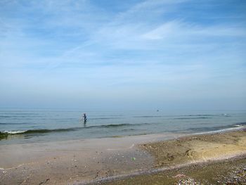 Scenic view of beach against sky