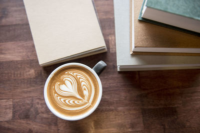 High angle view of cappuccino on table