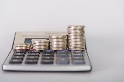 Close-up of coins on table