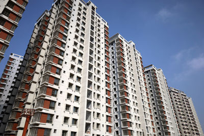 Low angle view of modern buildings against clear sky