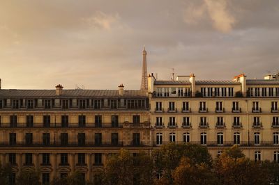 View of buildings in city against sky