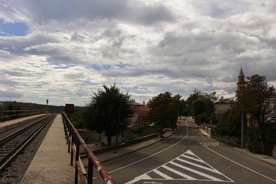 View of road against cloudy sky