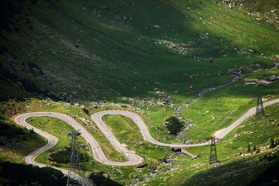 High angle view of winding road on landscape