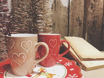 Close-up of coffee cup on table