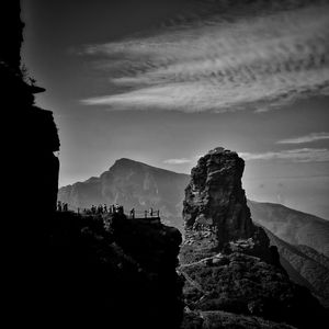 Scenic view of silhouette mountain against sky