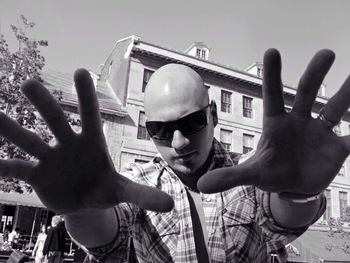 Cropped image of woman holding camera