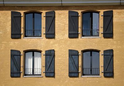 Facade of building with window shutters