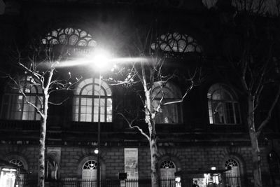 Low angle view of illuminated building at night