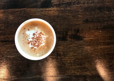 Directly above shot of cappuccino on table