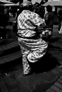 Rear view of a woman walking outdoors