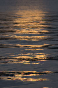 Scenic view of sea against sky at sunset