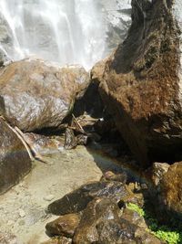 High angle view of rocks in sea