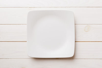 Close-up of empty plate on table