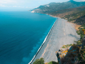 High angle view of bay against clear sky