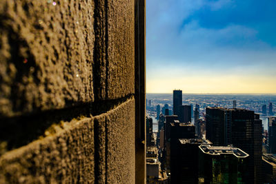 Buildings in city against sky