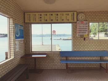 View of swimming pool by sea against sky