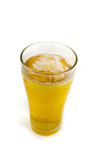 Close-up of drink against white background