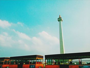 Low angle view of lighthouse against blue sky