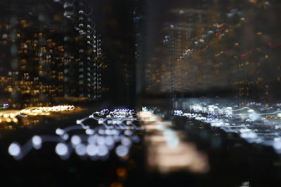 Reflection of illuminated lights on glass