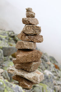 Close-up of stones stack on rock