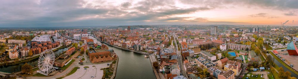 High angle view of city against sky during sunset