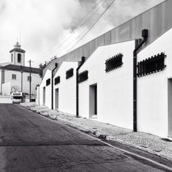 View of road along buildings